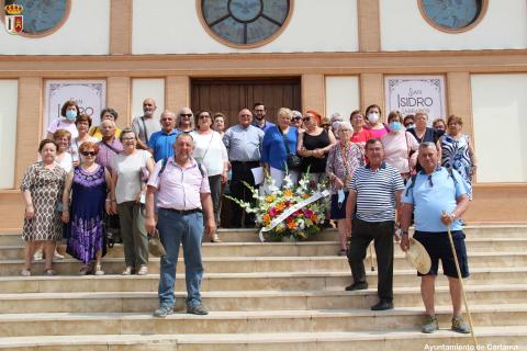 EL CPA DE ESTACIÓN DE CÁRTAMA HACE UNA OFRENDA FLORAL A SAN ISIDRO LABRADOR