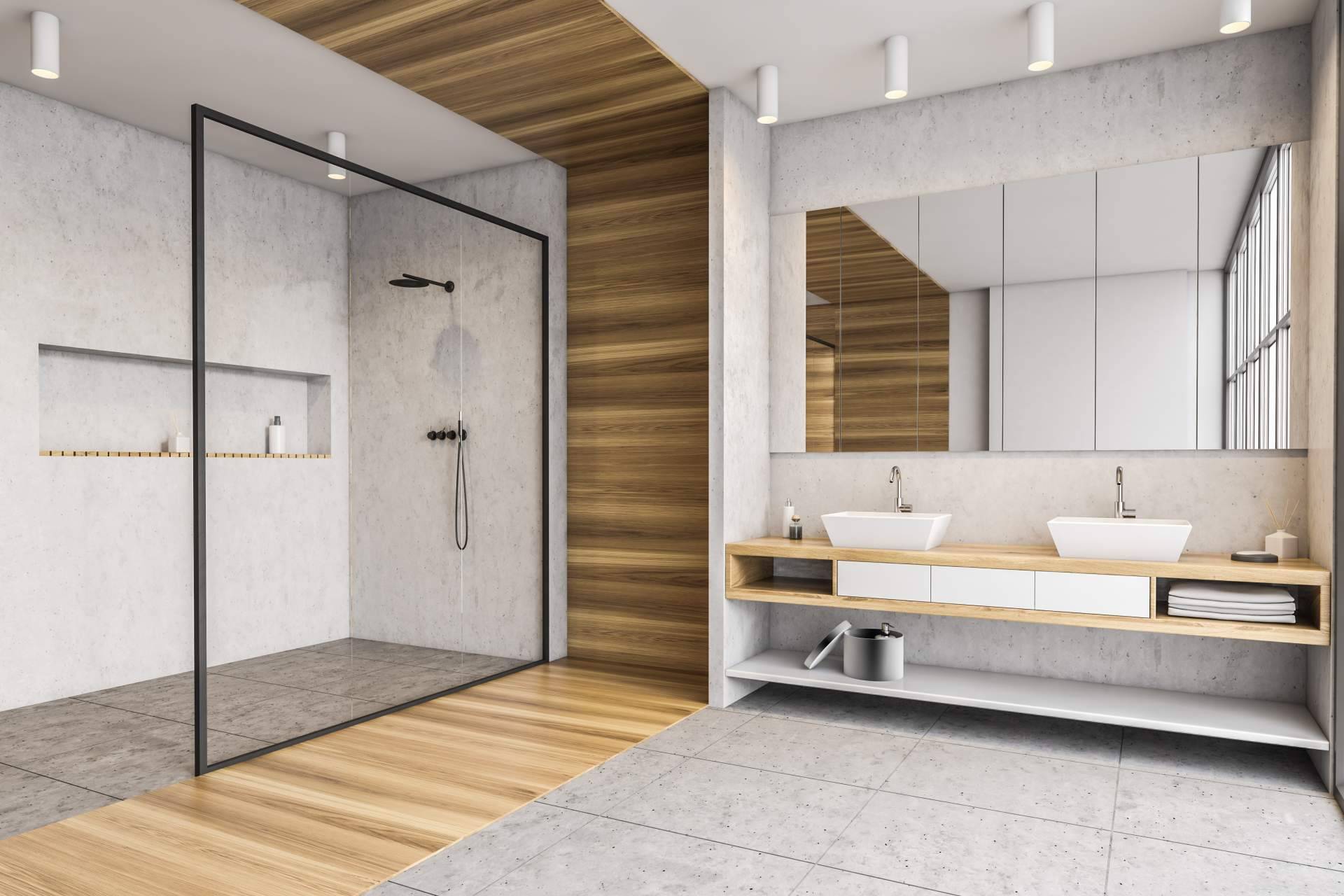 Bañoweb refuerza su catálogo con platos de ducha de resina a medida, espejos LED y mamparas